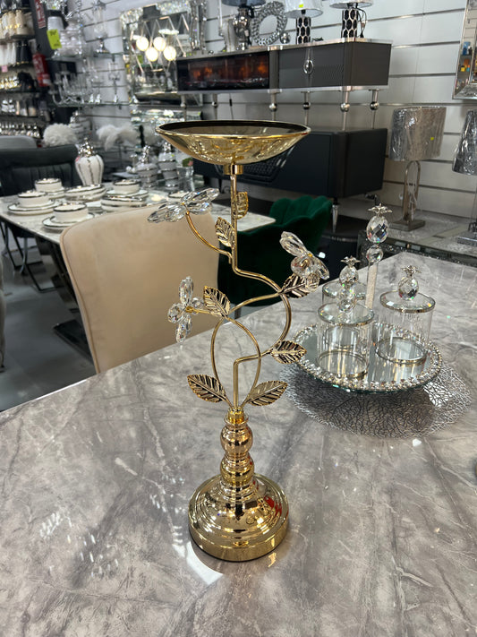 Porta-velas em formato de árvore com galhos dourados e base redonda