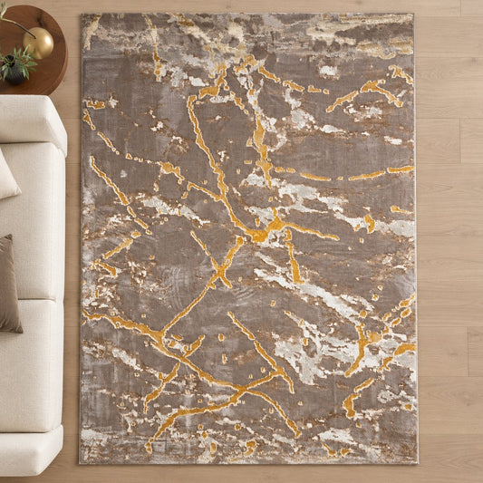 Alfombra diseño mármol marrón y dorado en salón elegante — vista cenital del dibujo completo