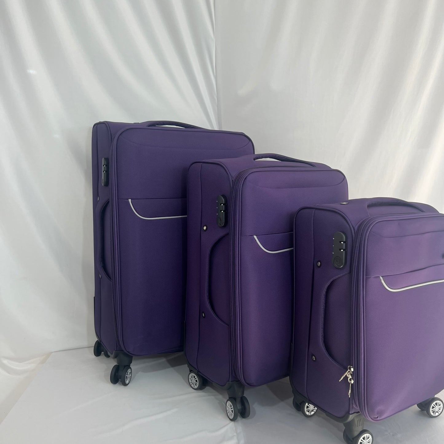 Set de 3 Maletas de Viaje Nadir – Morado con Ruedas Giratorias