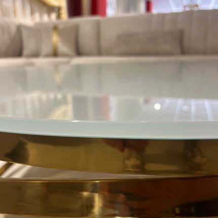 Mesa de centro de cristal blanco y patas acero dorado