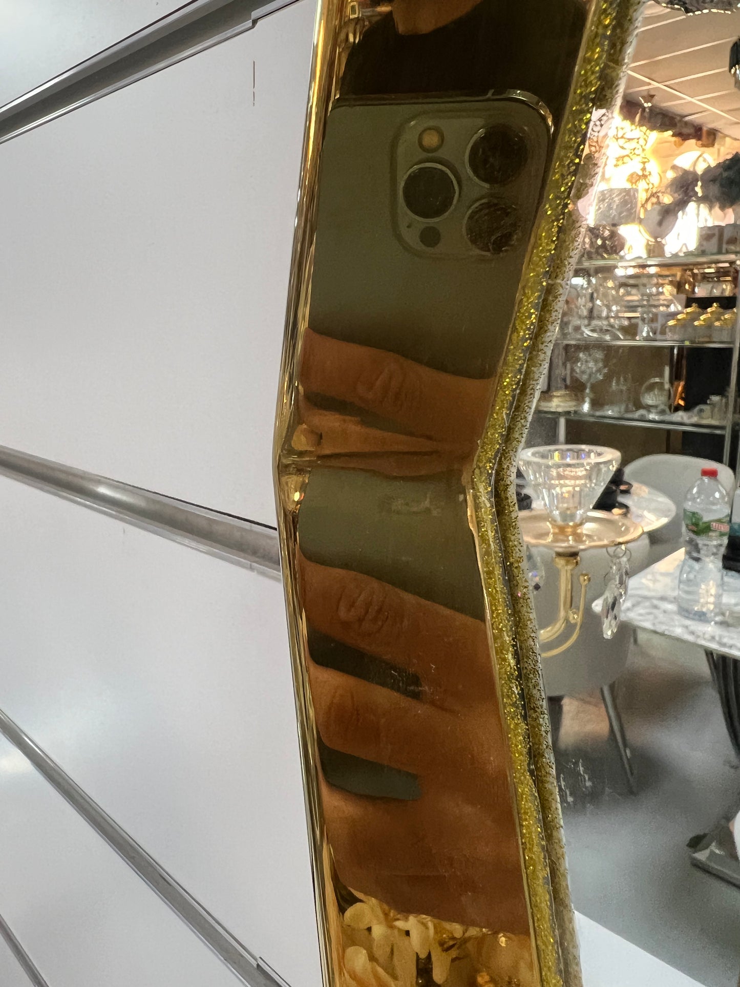 Espejo dorado de acero