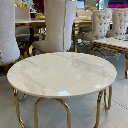 Mesa de centro de mármol blanco y patas acero dorado