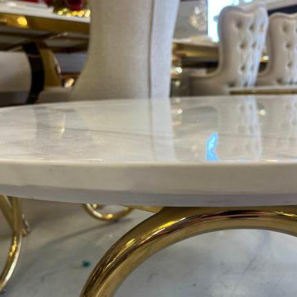 Mesa de centro de mármol blanco y patas acero dorado