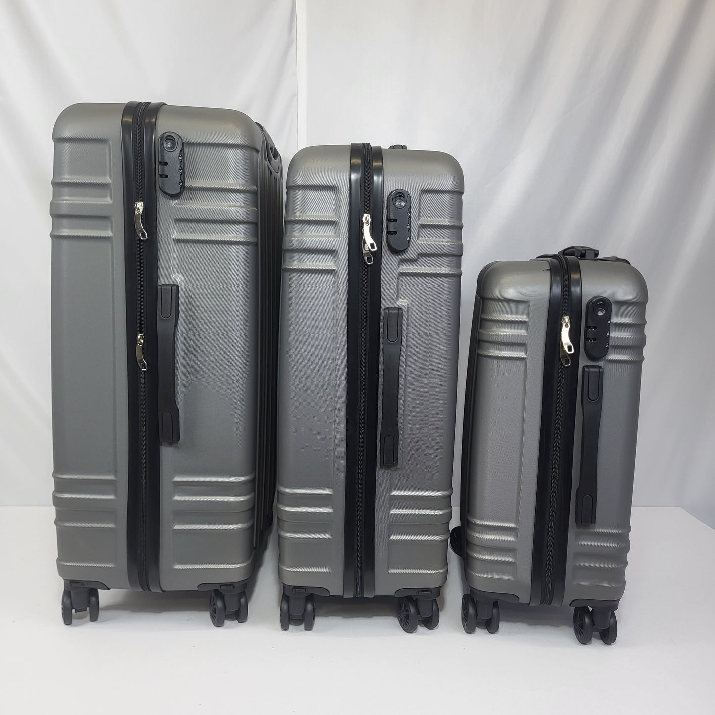 Set de Maletas Travel Pro 3 Piezas – Gris Rígido con Ruedas 360°