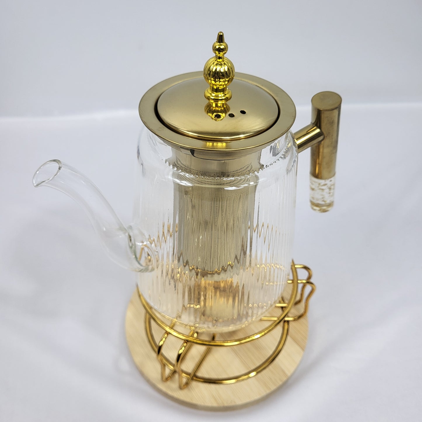 Tetera de Cristal Nayra con Infusor Dorado y Soporte Calientabebidas