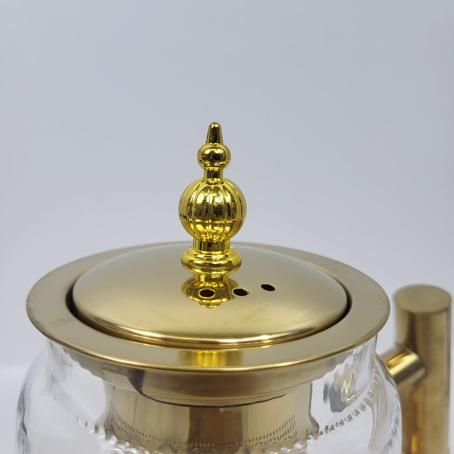 Tetera de Cristal Nayra con Infusor Dorado y Soporte Calientabebidas
