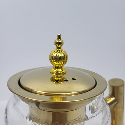 Tetera de Cristal Nayra con Infusor Dorado y Soporte Calientabebidas