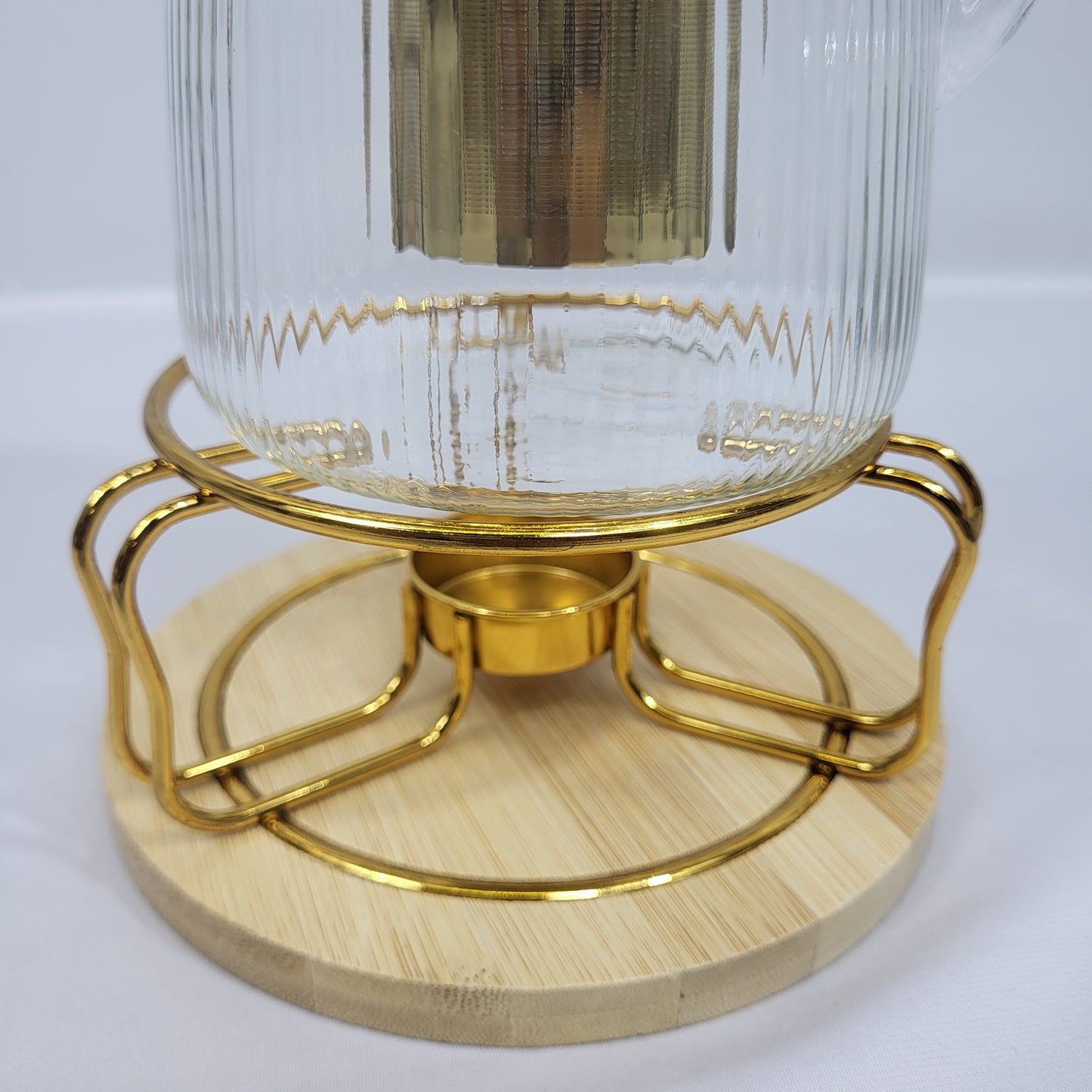 Tetera de Cristal Nayra con Infusor Dorado y Soporte Calientabebidas