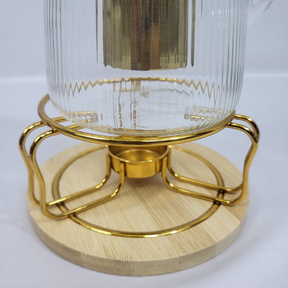 Tetera de Cristal Nayra con Infusor Dorado y Soporte Calientabebidas
