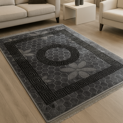 Tapete clássico cinzento com rebordo preto, de inspiração oriental – estilo árabe.