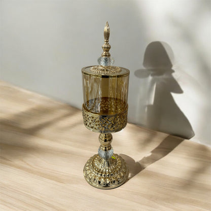 Copón decorativo dorado con tapa