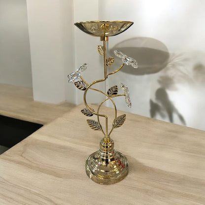 Portavelas árbol decorativo dorado con base de madera clara