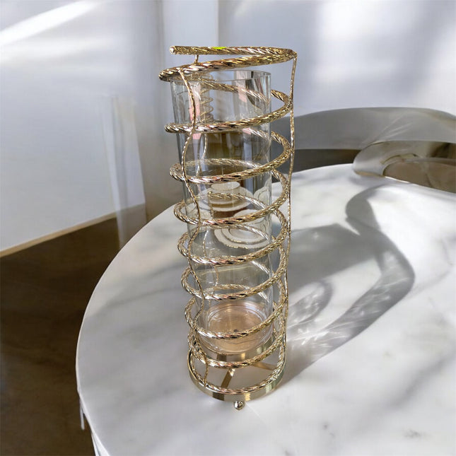 Castiçal alto em vidro e metal dourado com design moderno em espiral, 62 cm