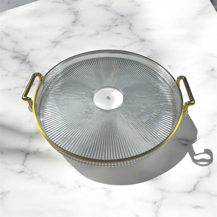 🟠 Bandeja redonda com alças douradas – Elegância para servir ou decorar – Plástico transparente