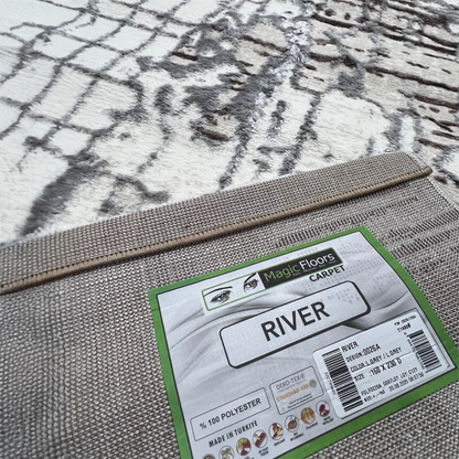 Alfombra River – Diseño abstracto moderno con acabado elegante
