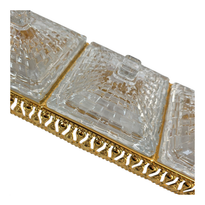 Elegante set de recipientes de cristal con base decorativa en metal dorado 💛