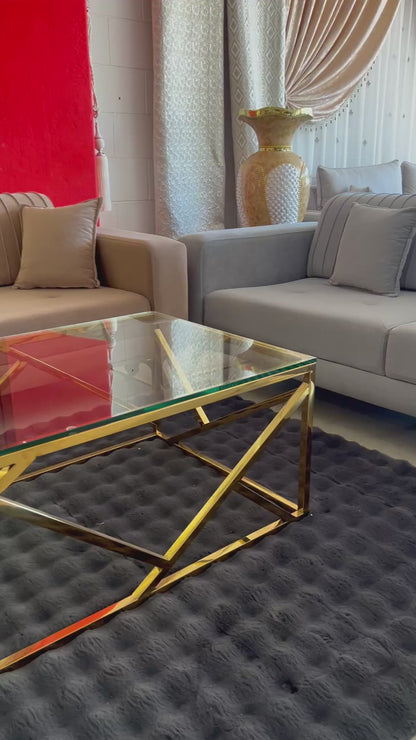 Mesa de centro de cristal y patas acero inoxidable dorado