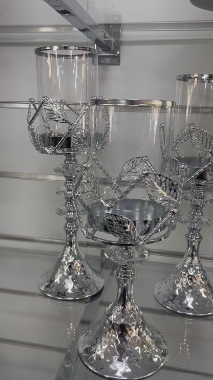 Portavelas moderno con copa de cristal y base tallada