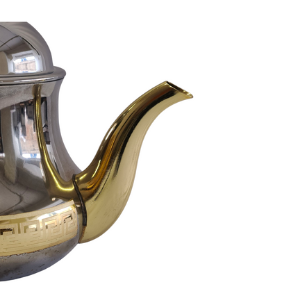 Tetera marroquí de acero inoxidable con detalles dorados, tapa con bisagra y pico antigoteo