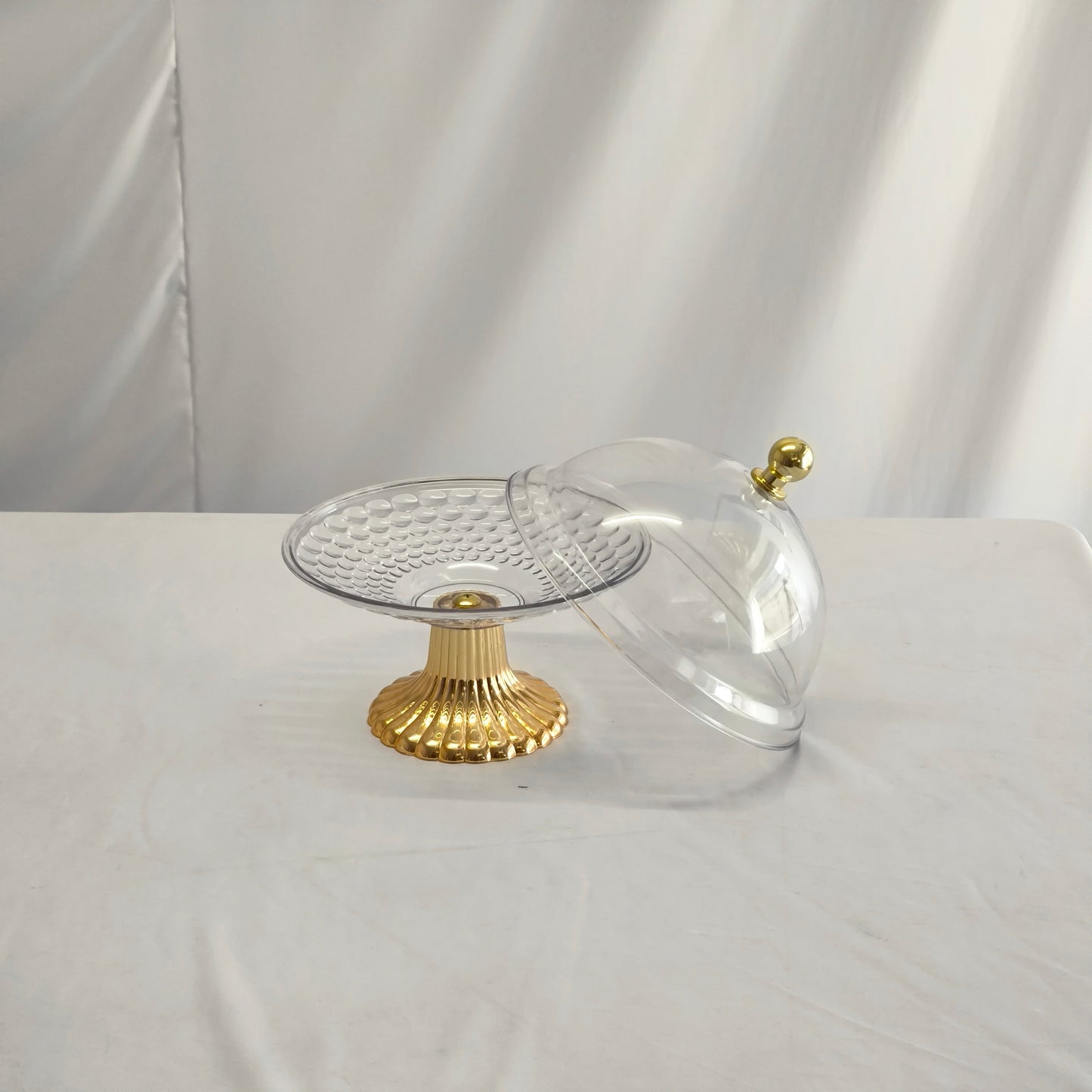 Sino decorativo em plástico transparente com base dourada – Estilo elegante